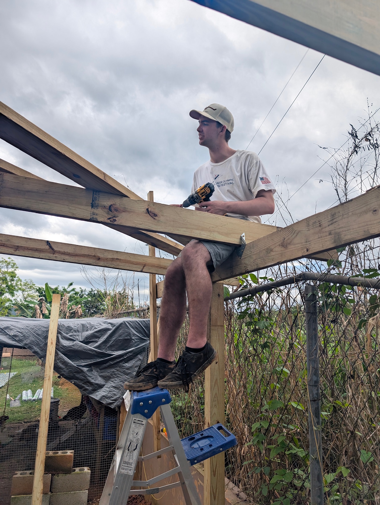 PXL_20250327_190524856 Elijah Dekker was our fearless roofer of the chicken coop today.
